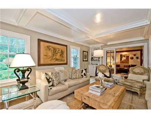 593 Hollow Tree Ridge Road Darien, CT 06820 - Photo 9 of 20 a living room with furniture and a table