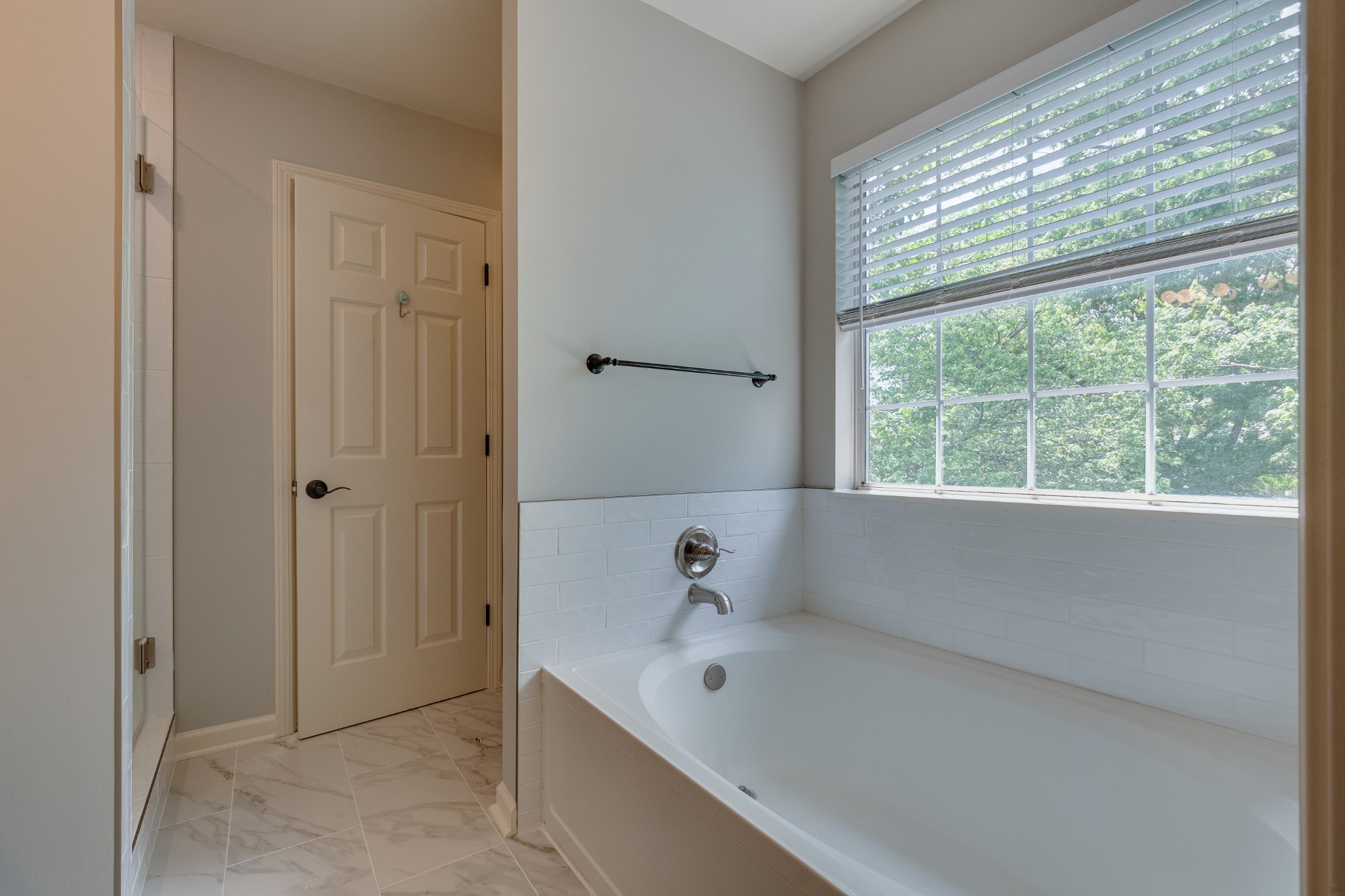 136 Cavalcade Circle Franklin, TN 37069 - Photo 17 of 31 a bathroom with a tub and shower