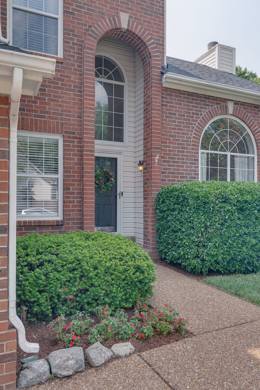 136 Cavalcade Circle Franklin, TN 37069 - Photo 3 of 31 a front view of a house with garden