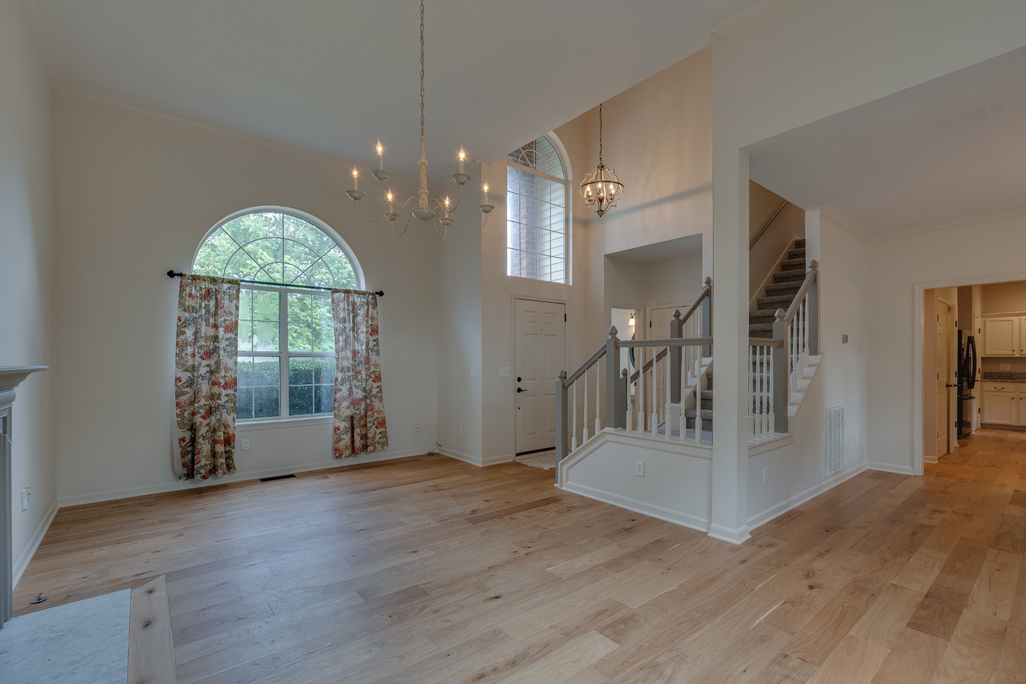 136 Cavalcade Circle Franklin, TN 37069 - Photo 6 of 31 a view of entryway with wooden floor and a front door