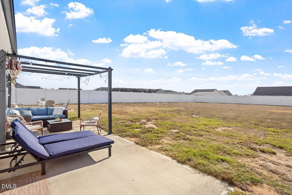 4045 Needham Road Bailey, NC 27807 - Photo 24 of 32 a sitting area with view of lake
