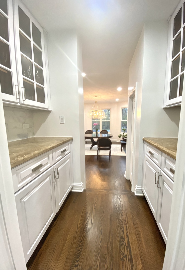 700 Timber Trail Riverwoods, IL 60015 - Photo 15 of 55 a kitchen with stainless steel appliances a stove a sink and a refrigerator