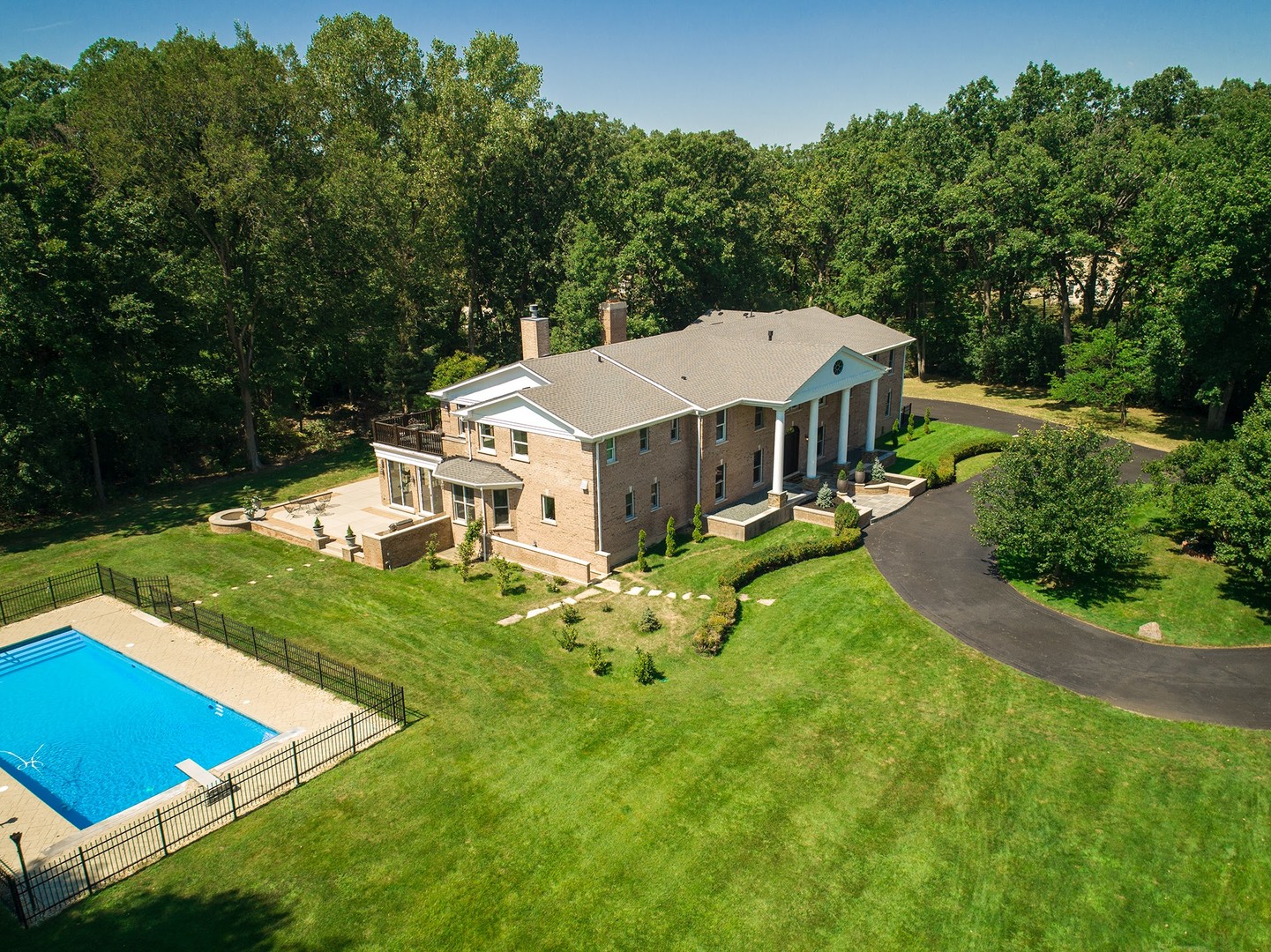 700 Timber Trail Riverwoods, IL 60015 - Photo 3 of 55 an aerial view of residential houses with yard and trees