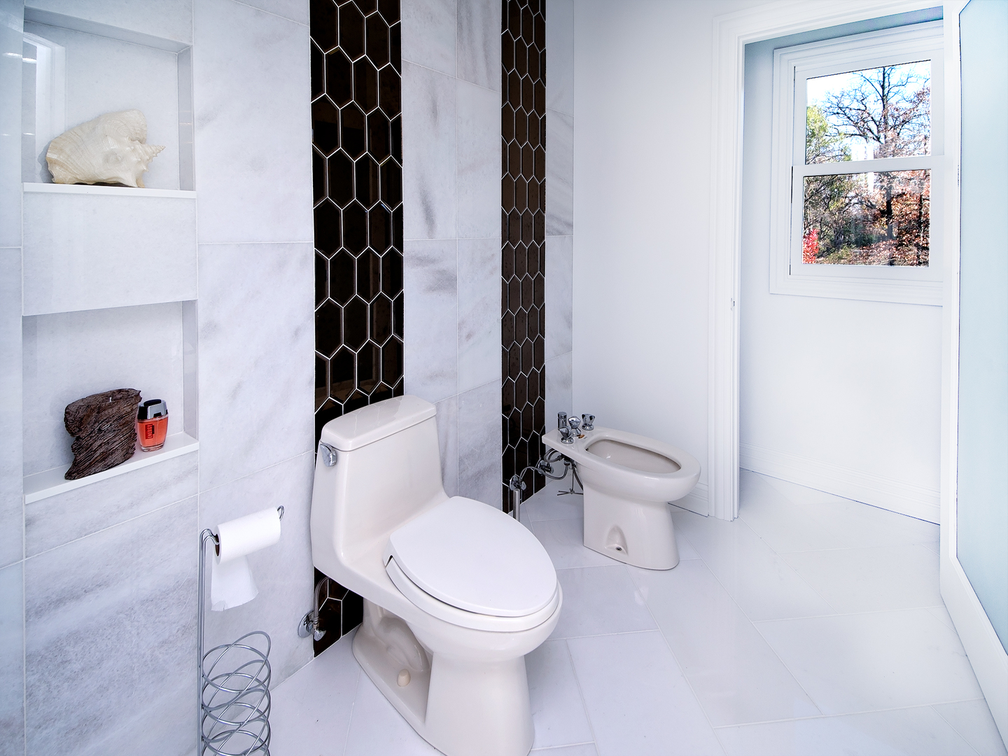 700 Timber Trail Riverwoods, IL 60015 - Photo 23 of 55 a white toilet sitting next to a bathroom sink and vanity