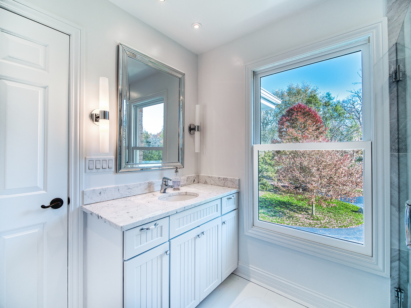 700 Timber Trail Riverwoods, IL 60015 - Photo 36 of 55 a bathroom with a granite countertop sink mirror and window