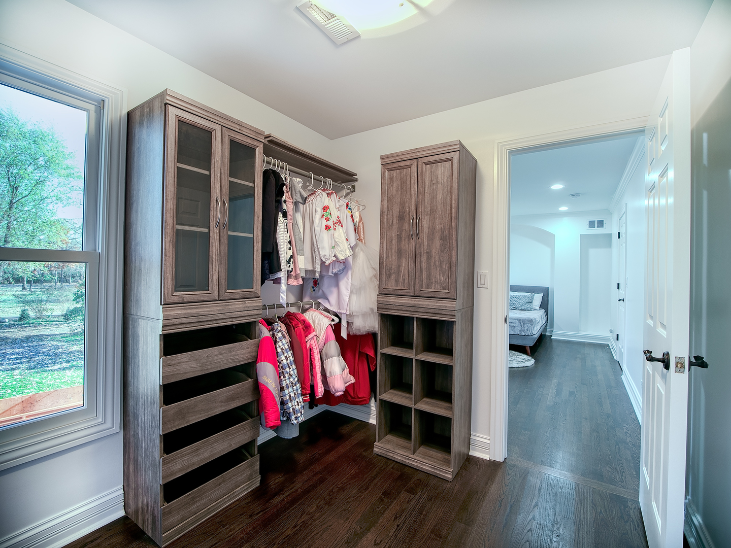 700 Timber Trail Riverwoods, IL 60015 - Photo 38 of 55 a view of walk in closet with clothes and shoes