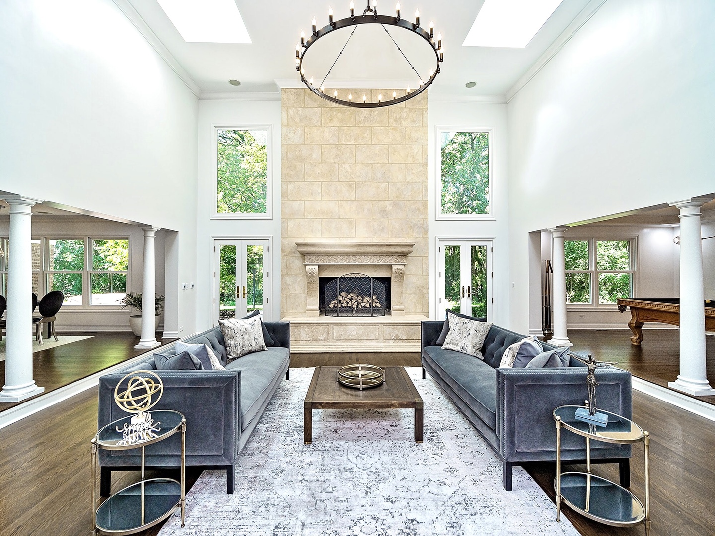 700 Timber Trail Riverwoods, IL 60015 - Photo 9 of 55 a living room with furniture a fireplace and floor to ceiling windows