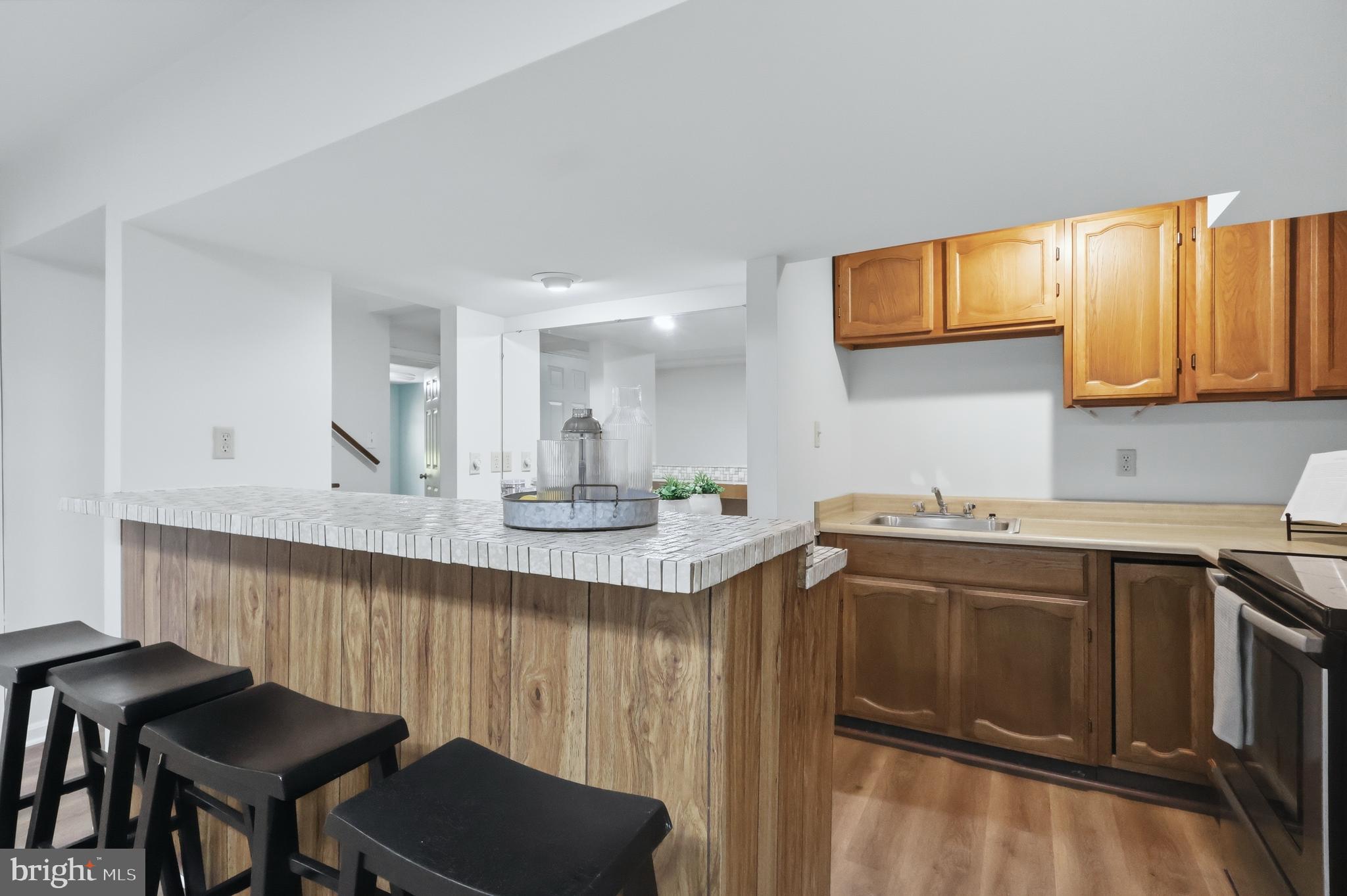 23500 River Road Lexington Park, MD 20653 - Photo 72 of 92 Lower Level Kitchenette and Bar
