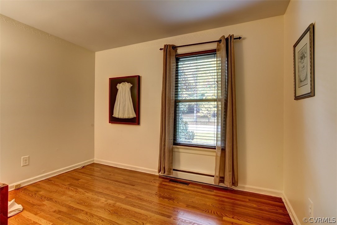 1310 Black Heath Road Midlothian, VA 23113 - Photo 15 of 24 Bedroom #3 has hardwood floors and wood blinds.