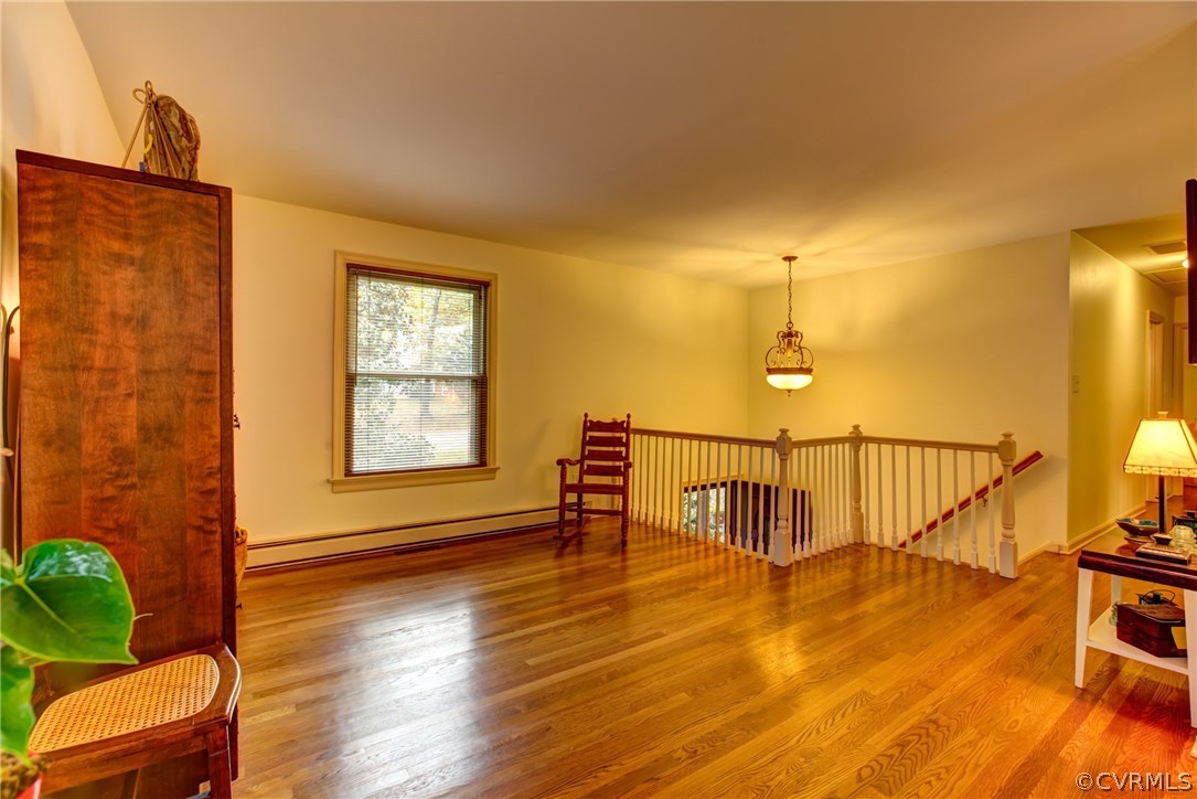 1310 Black Heath Road Midlothian, VA 23113 - Photo 4 of 24 The open living room with its gorgeous oak floors!