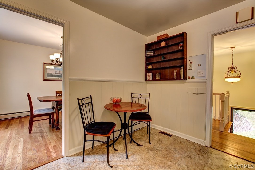 1310 Black Heath Road Midlothian, VA 23113 - Photo 8 of 24 Eat-in area of kitchen accented by paneling.