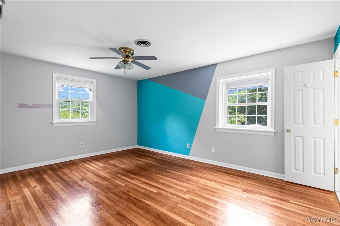 11911 Kilrenny Road Midlothian, VA 23113 - Photo 15 of 39 a view of a room with a ceiling fan and a window