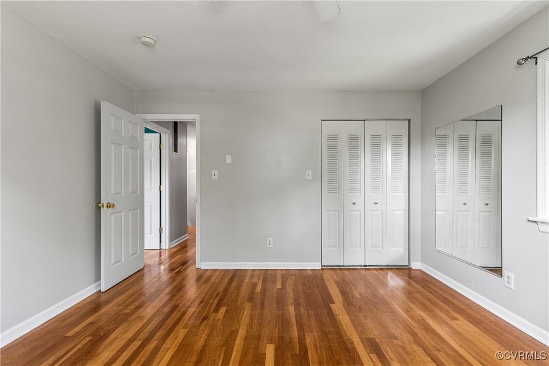 11911 Kilrenny Road Midlothian, VA 23113 - Photo 19 of 39 a view of an empty room and wooden floor