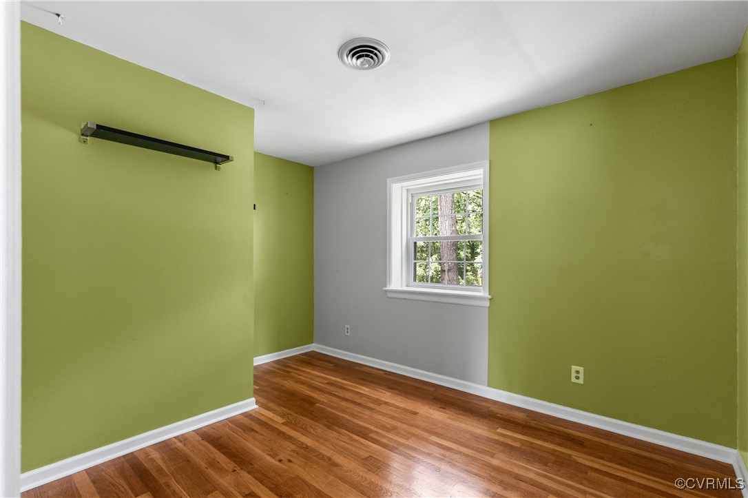 11911 Kilrenny Road Midlothian, VA 23113 - Photo 22 of 39 a room with a bed and a window