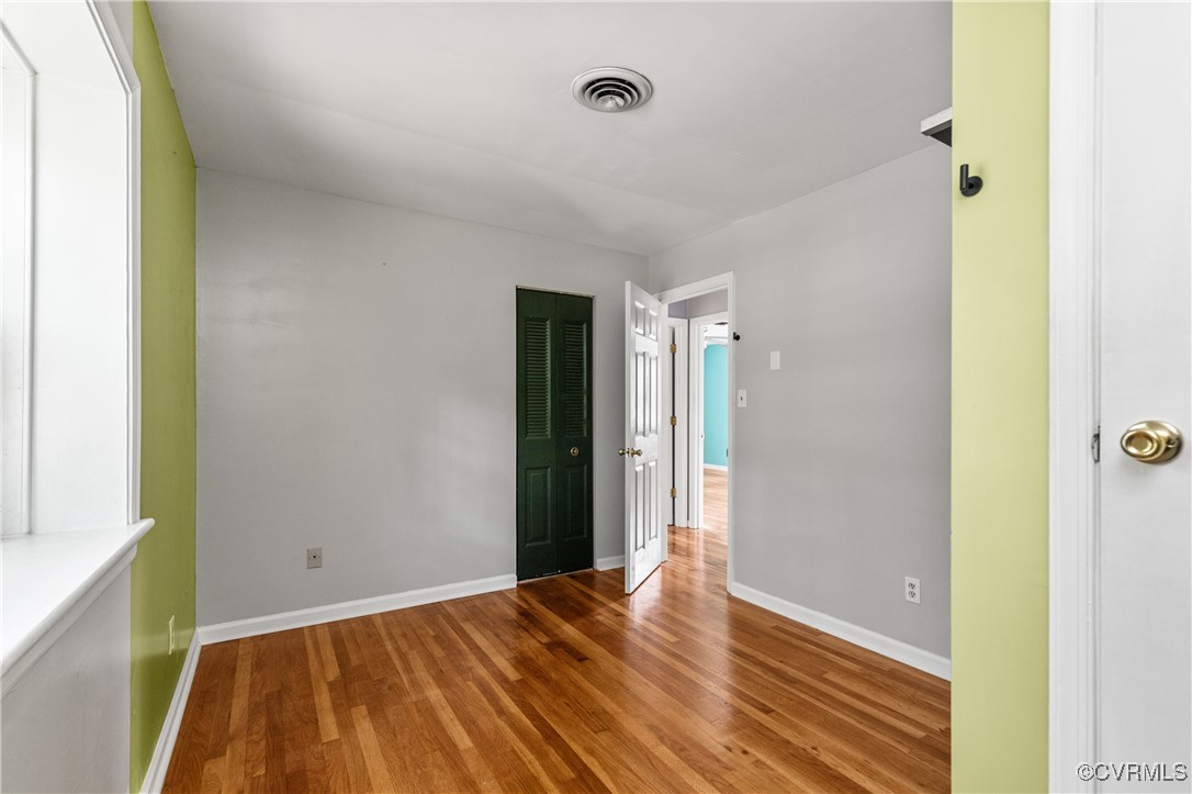 11911 Kilrenny Road Midlothian, VA 23113 - Photo 23 of 39 a view of a room with wooden floor