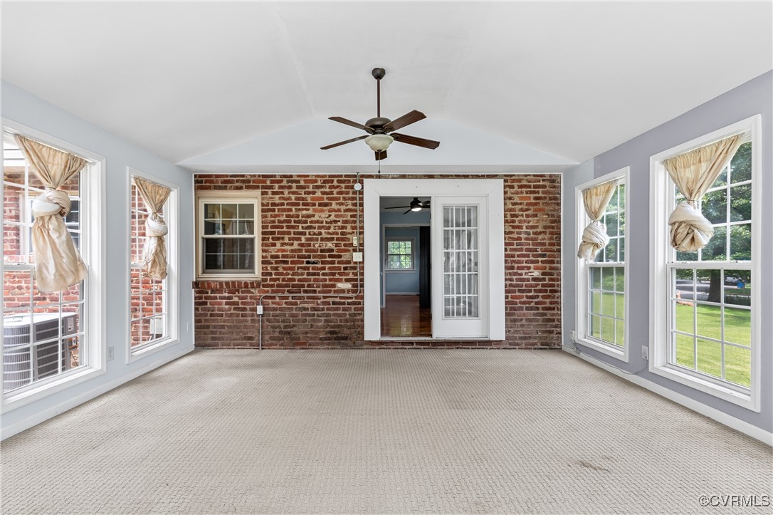 11911 Kilrenny Road Midlothian, VA 23113 - Photo 27 of 39 a view of a livingroom with a ceiling fan and windows
