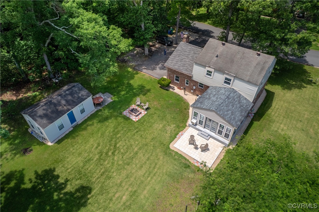 11911 Kilrenny Road Midlothian, VA 23113 - Photo 33 of 39 an aerial view of a house with a garden and trees