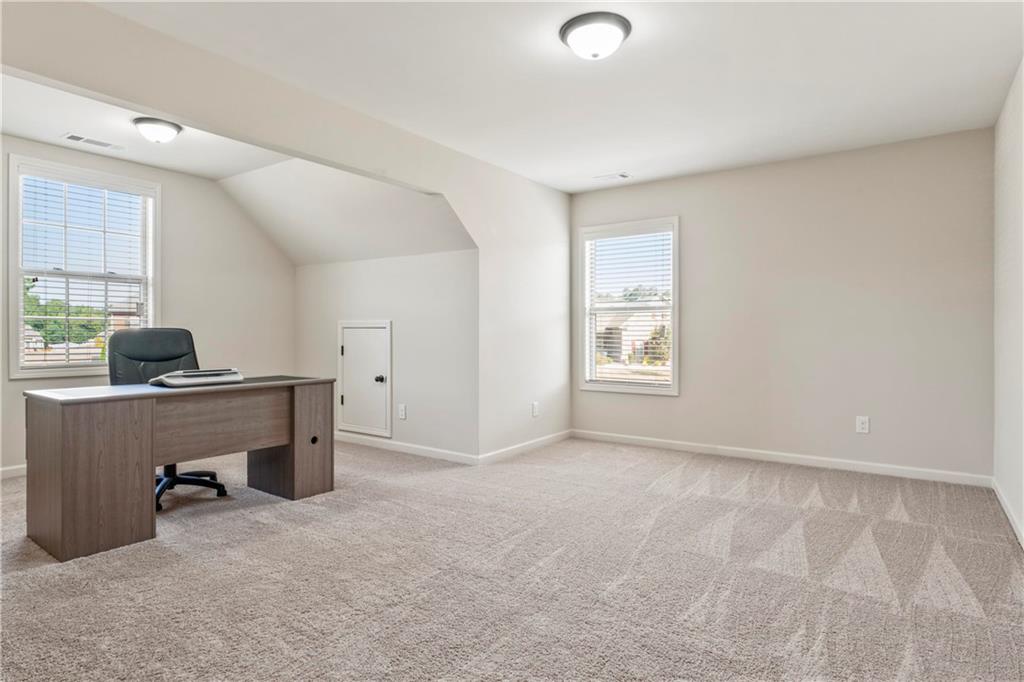 7004 Becca Lane Locust Grove, GA 30248 - Photo 23 of 39 a workspace with furniture and window