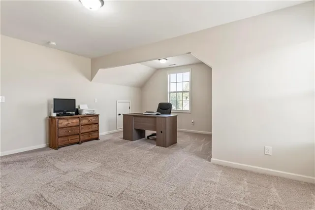 a room with furniture and a window