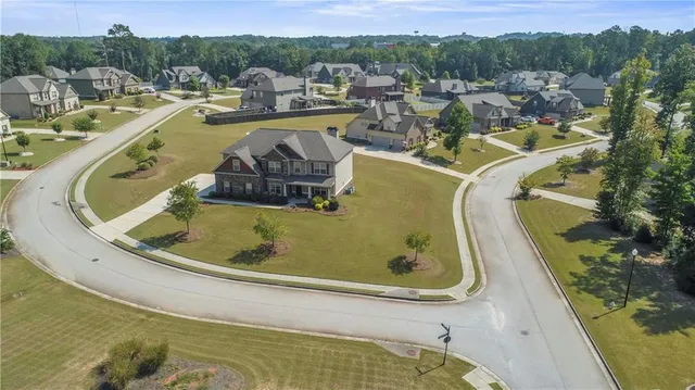 a view of a swimming pool with a lake view