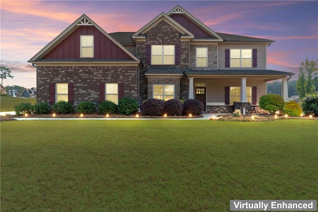 7004 Becca Lane Locust Grove, GA 30248 - Photo 37 of 39 a front view of a house with a yard