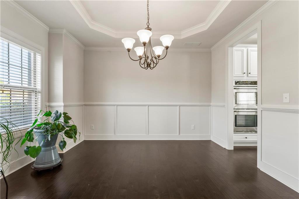 7004 Becca Lane Locust Grove, GA 30248 - Photo 5 of 39 a view of an empty room with a window