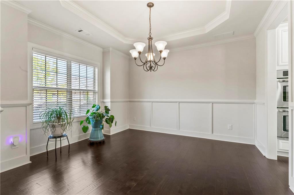 7004 Becca Lane Locust Grove, GA 30248 - Photo 6 of 39 a view of a room with wooden floor