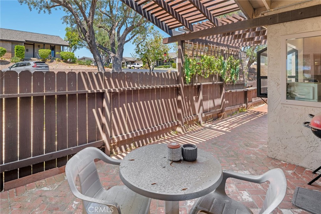 1400 Market Street Vista, CA 92084 - Photo 24 of 31 a view of a chairs and table in the patio