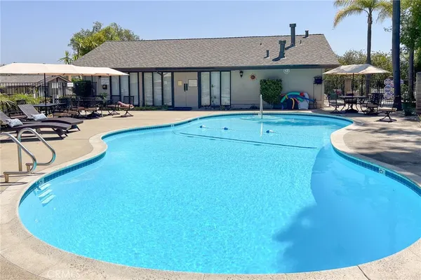 a wooden fence with some plants