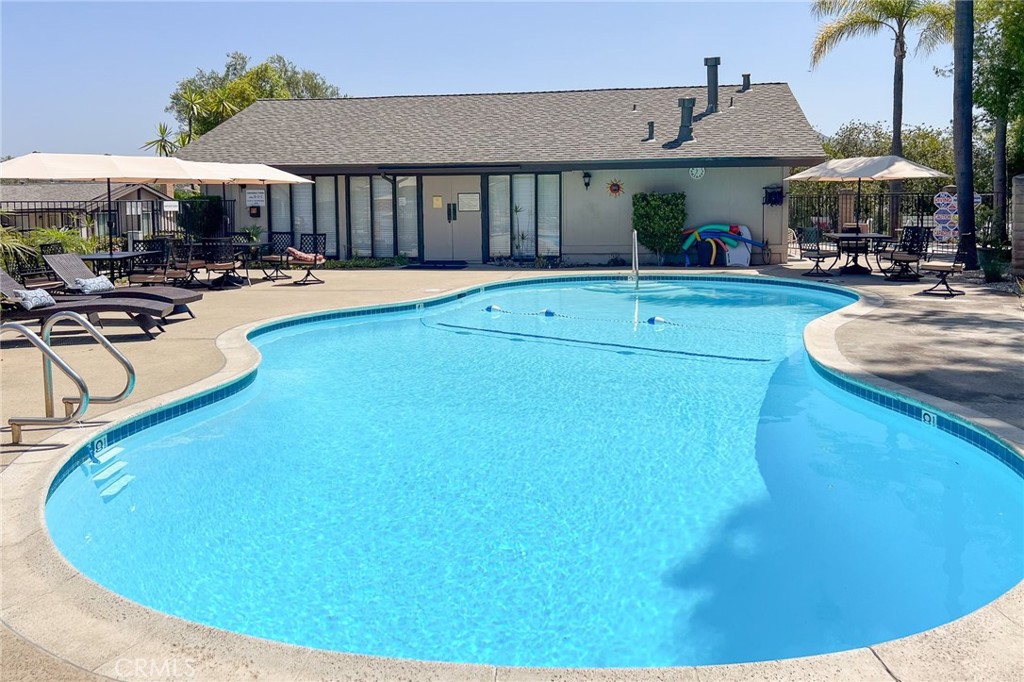 1400 Market Street Vista, CA 92084 - Photo 30 of 31 a swimming pool with outdoor seating yard and patio
