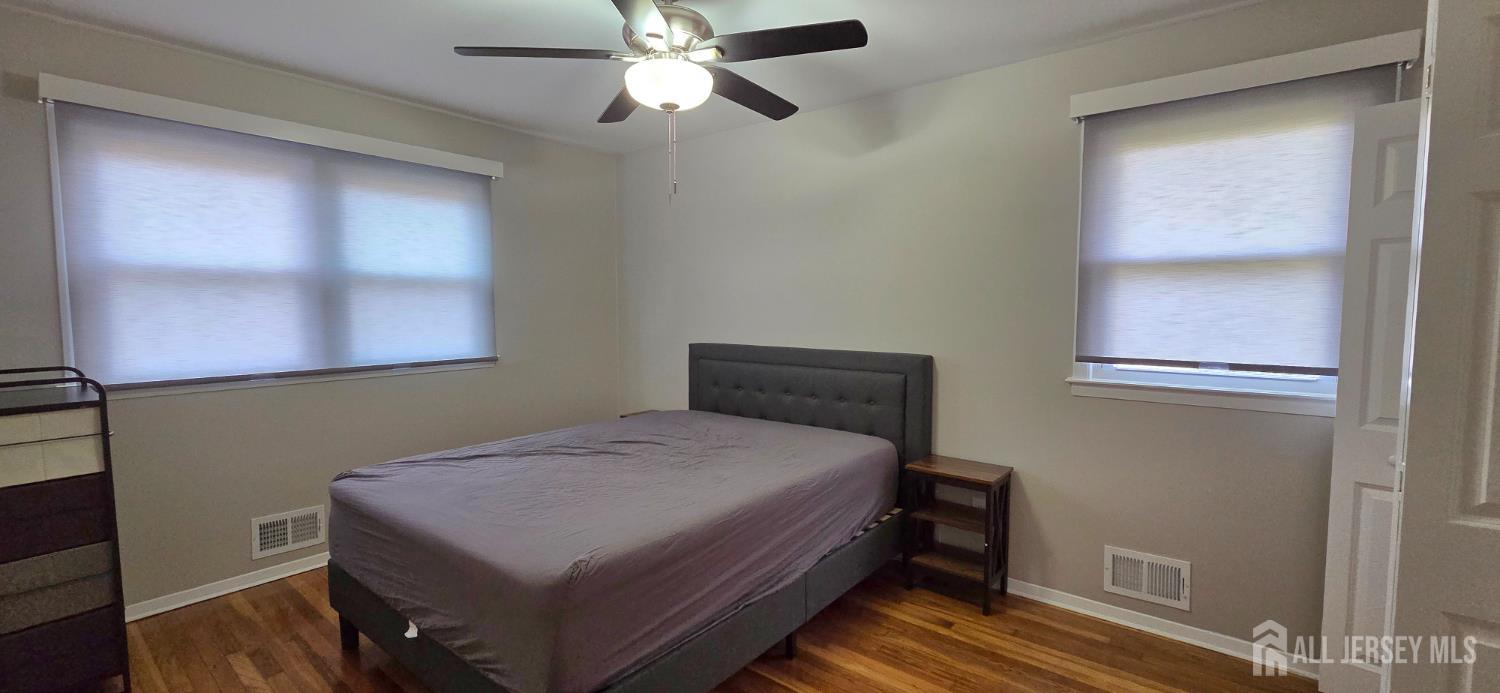 22 Oakbranch Road Cranbury, NJ 08512 - Photo 11 of 20 a bedroom with a bed and a window