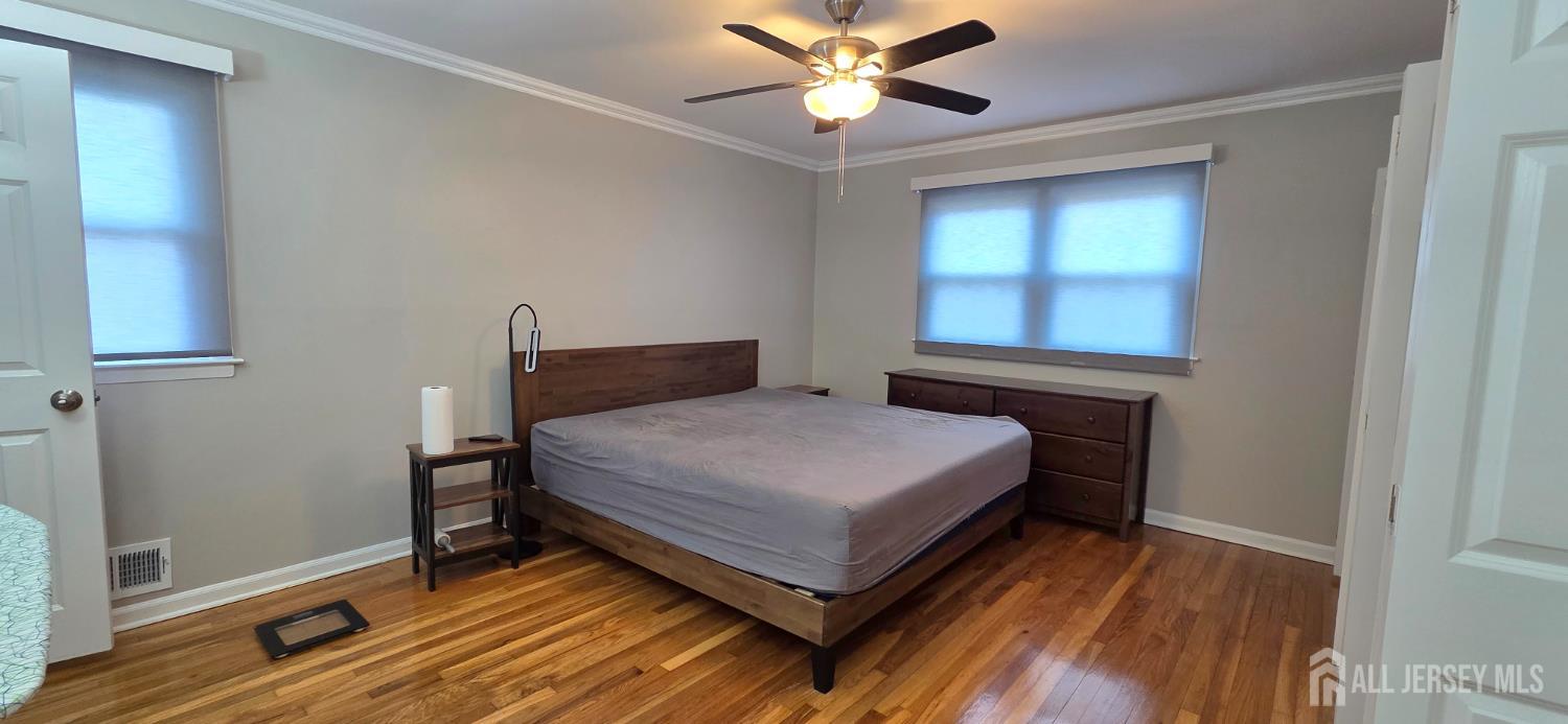 22 Oakbranch Road Cranbury, NJ 08512 - Photo 12 of 20 a bedroom with a bed and window