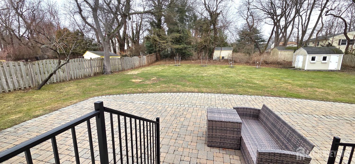 22 Oakbranch Road Cranbury, NJ 08512 - Photo 16 of 20 a view of a backyard with trees