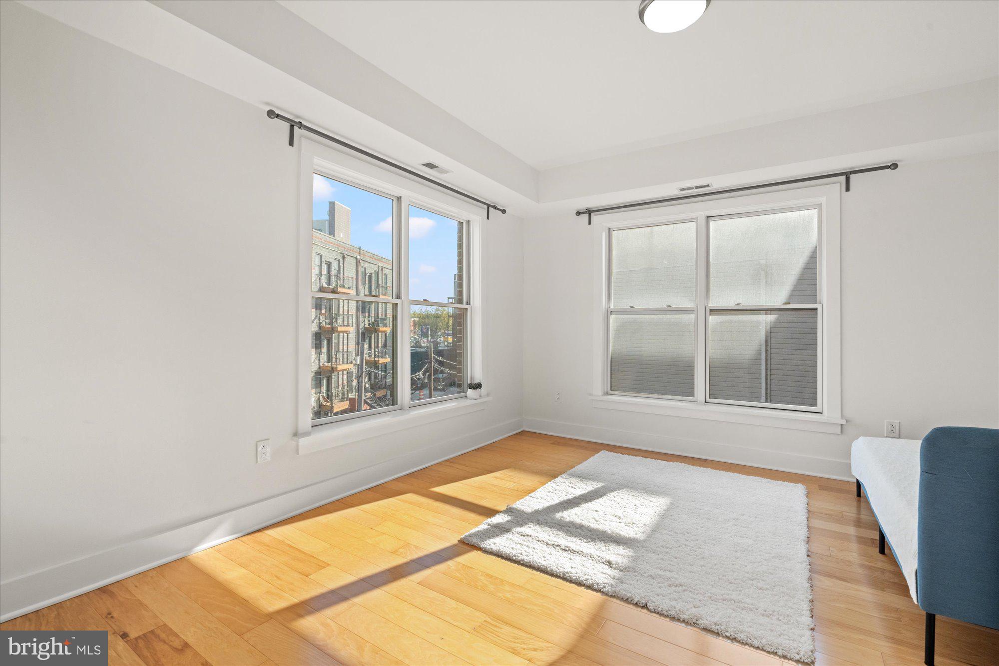 449 R Street Northwest, Unit 301 Washington, DC 20001 - Photo 18 of 37 a view of an empty room with a window