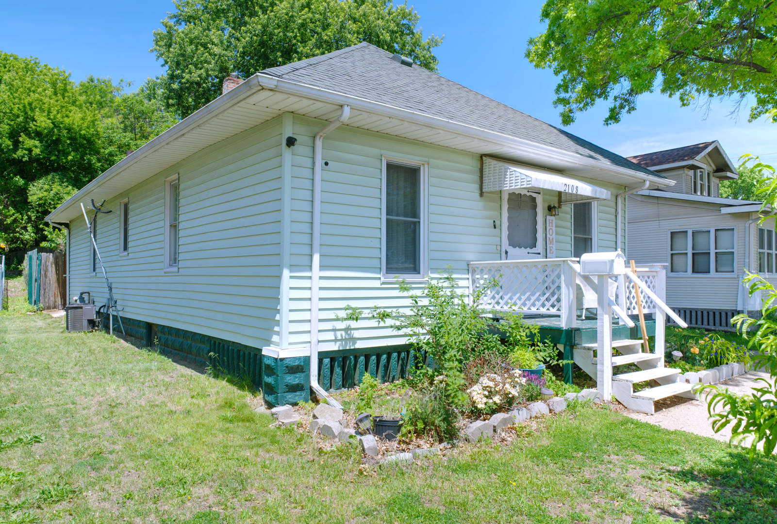 2108 Camanche Avenue Clinton, IA 52732 - Photo 17 of 22 a view of a house with a yard