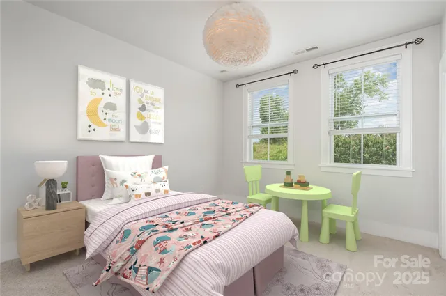 a kitchen with stainless steel appliances granite countertop a refrigerator a oven and a sink with wooden floor