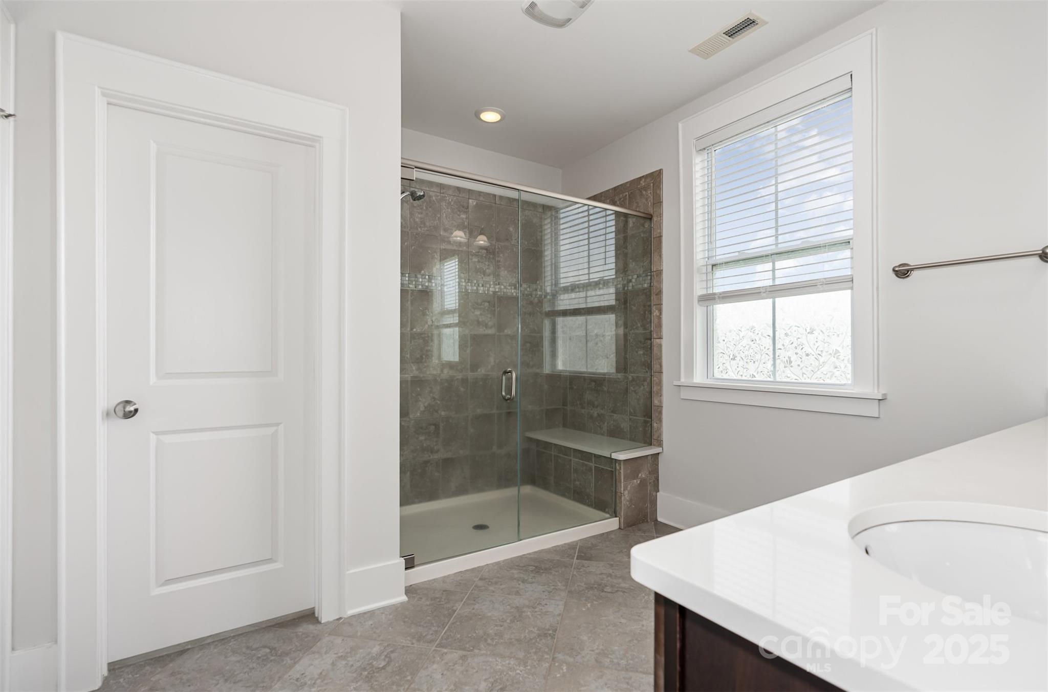 526 Spring Landing Drive Rock Hill, SC 29730 - Photo 29 of 48 a bathroom with a shower and a bathtub