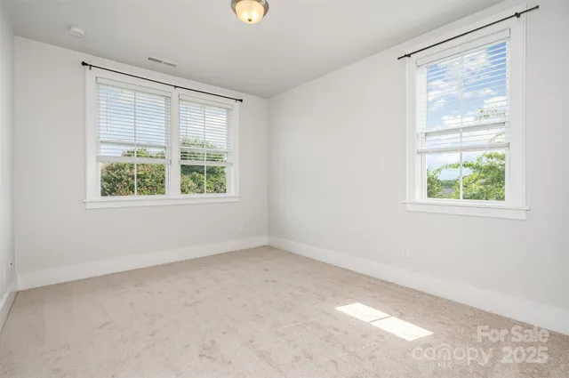 a view of a livingroom with a staircase