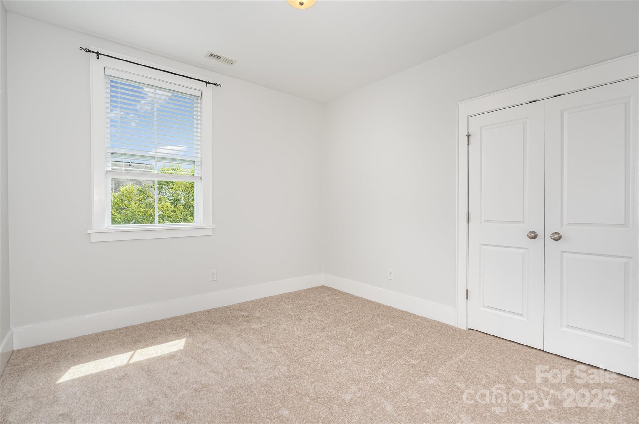 526 Spring Landing Drive Rock Hill, SC 29730 - Photo 36 of 48 a view of an empty room with a window