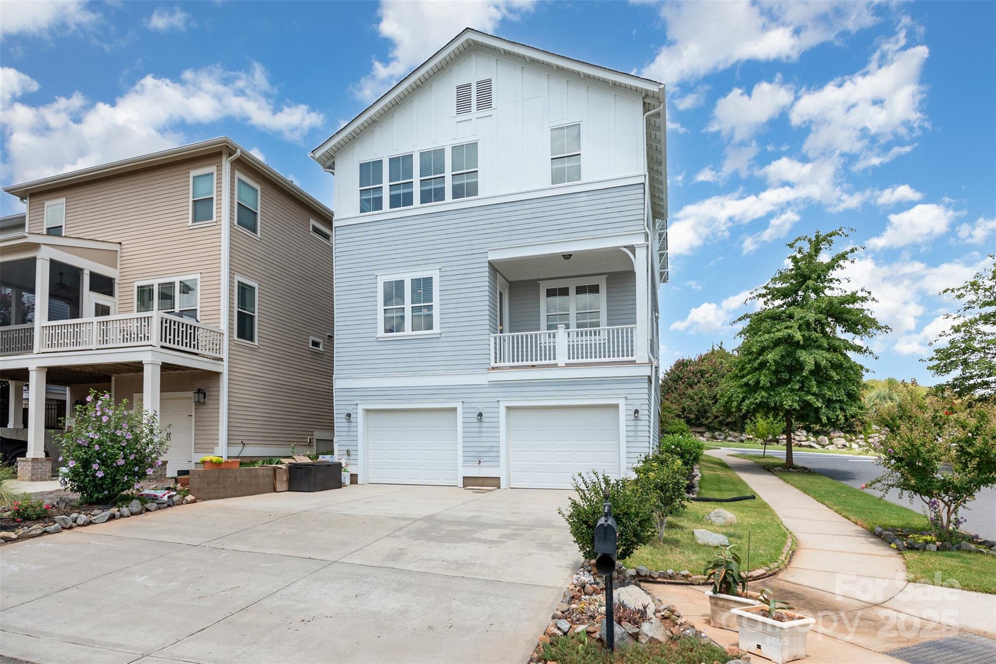 526 Spring Landing Drive Rock Hill, SC 29730 - Photo 42 of 48 a front view of a house with a yard and garage