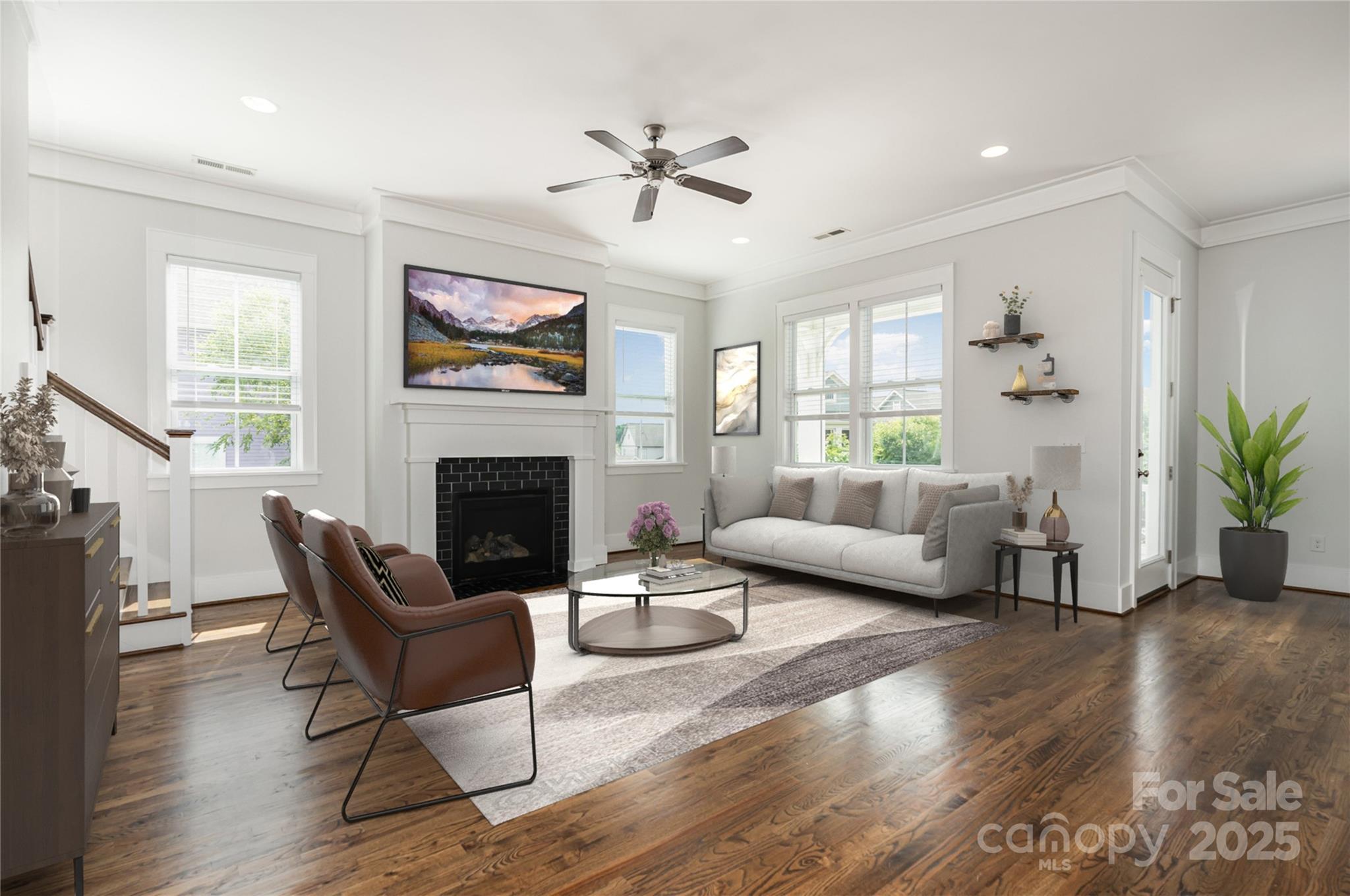 526 Spring Landing Drive Rock Hill, SC 29730 - Photo 5 of 48 a living room with furniture a fireplace and a flat screen tv