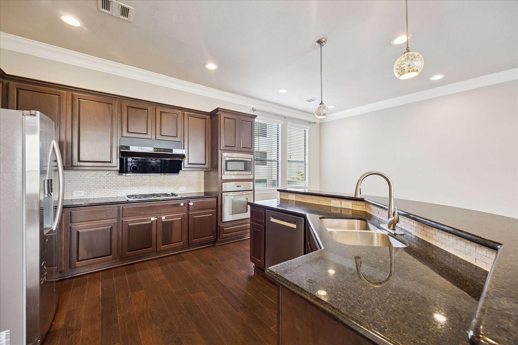 3002 Soutine Street Houston, TX 77021 - Photo 7 of 22 Gleaming granite counter top and high end stainless steel appliances!