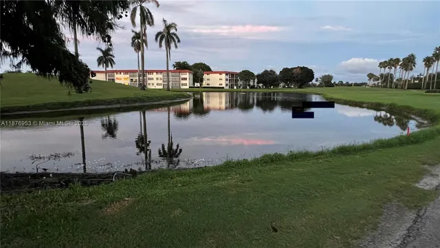 a view of a garden with houses