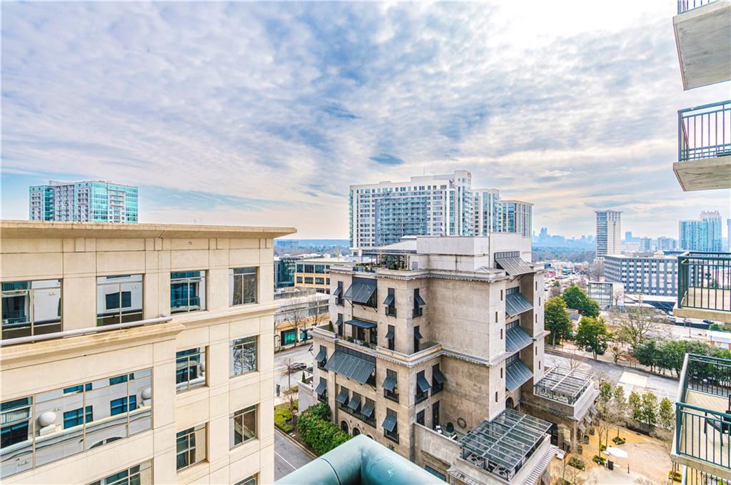 3040 Peachtree Road, Unit 1003 Atlanta, GA 30305 - Photo 23 of 42 a view of a buildings with yard