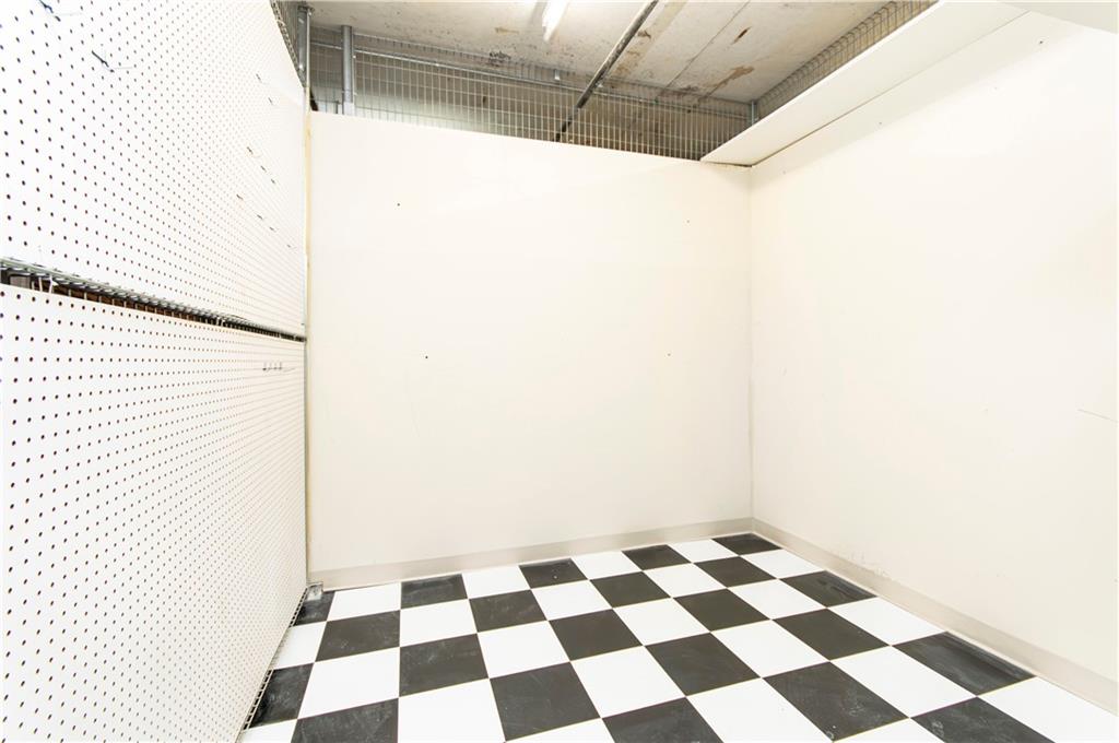 3040 Peachtree Road, Unit 1003 Atlanta, GA 30305 - Photo 26 of 42 a black and white checkered floor
