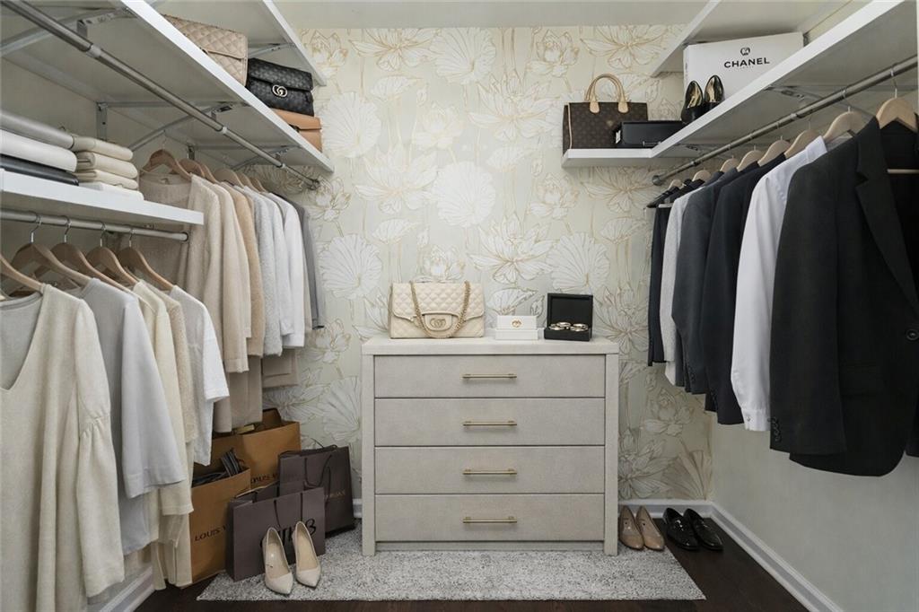 3040 Peachtree Road, Unit 1003 Atlanta, GA 30305 - Photo 4 of 42 a view of walk in closet with clothes and shoes