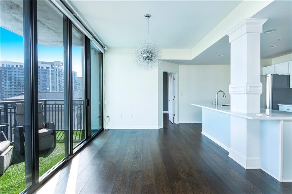 3040 Peachtree Road, Unit 1003 Atlanta, GA 30305 - Photo 7 of 42 a view of a kitchen from the hallway