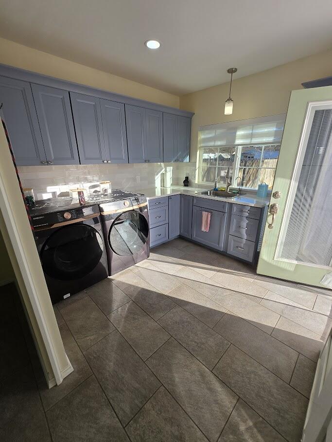3315 27th Street Lubbock, TX 79410 - Photo 18 of 32 a kitchen with a sink and a stove top oven