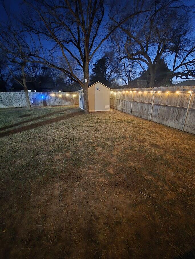 3315 27th Street Lubbock, TX 79410 - Photo 24 of 32 a view of a room with wooden walls