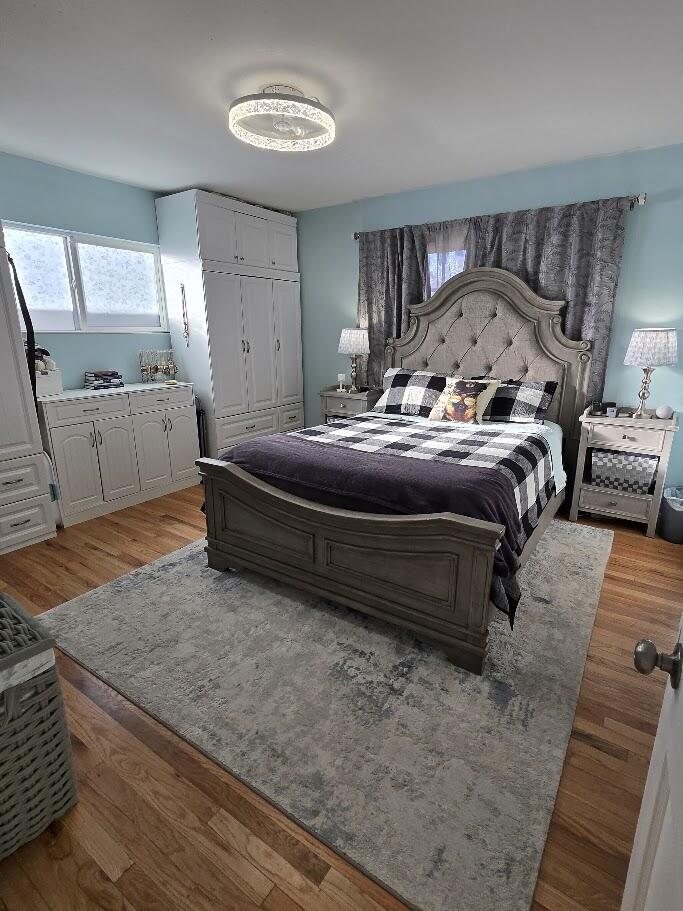 3315 27th Street Lubbock, TX 79410 - Photo 25 of 32 a bedroom with a bed and window